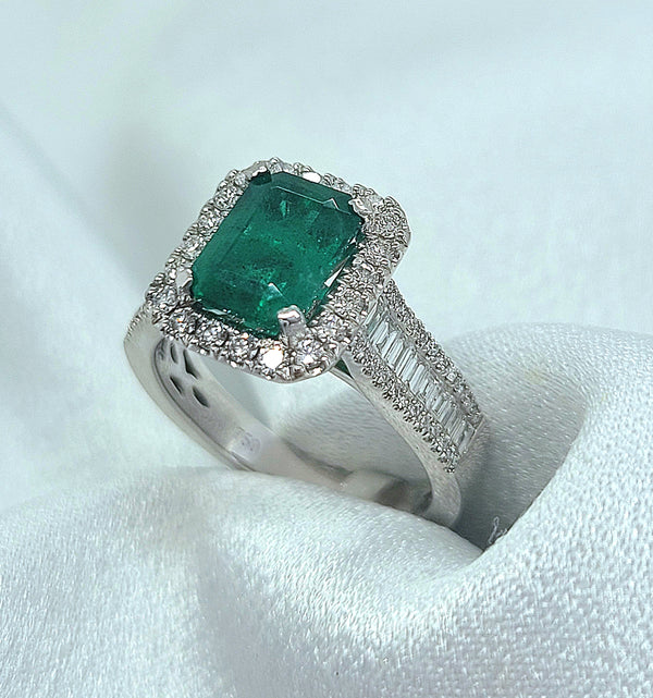 18kt. White Gold Emerald and Diamond Ring with Baguettes