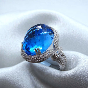 18kt. White Gold Blue Topaz and Diamond Ring