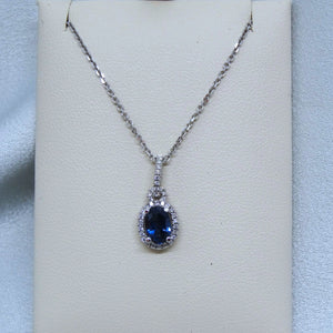 18kt. White Gold Diamond and Blue Sapphire Pendant